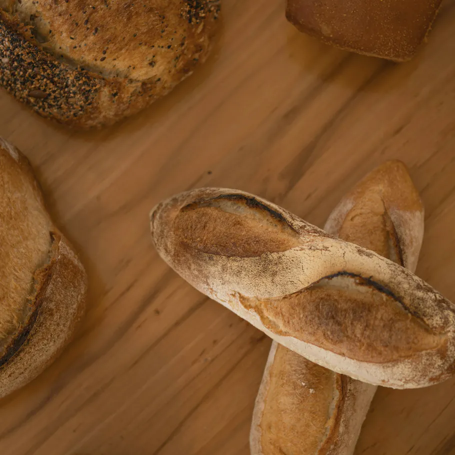 Bread from the town bakery on the timber table